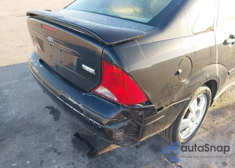 2003 Ford Focus Zts z USA, uszkodzony, nr VIN 1FAHP38323W251074